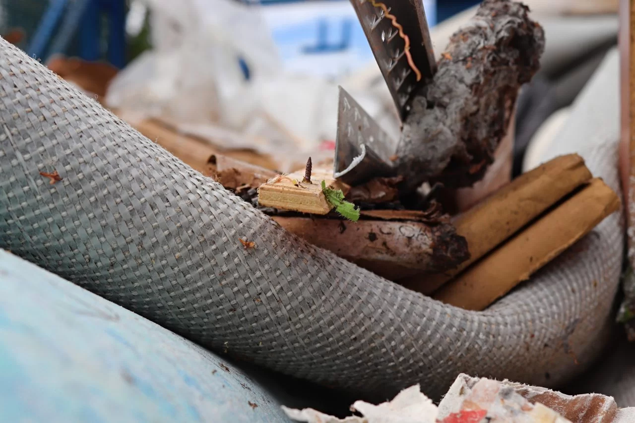 old dirty carpet and underlay in a pile